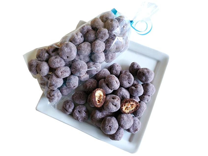 Bag and small dish pile of dark chocolate covered Falconglen organic blueberries